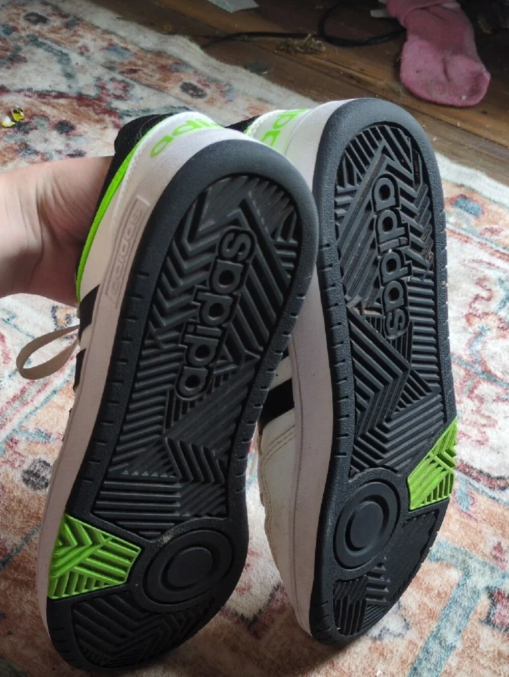 White Adidas Sneakers with Black Stripes and Neon Green Accent